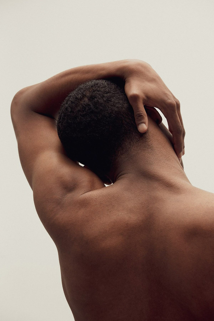 Person stretching the shoulder and upper back